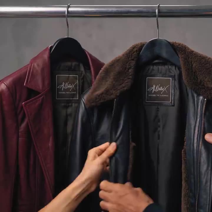 Leather jackets arranged on a rack in a studio